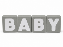 Load image into Gallery viewer, Four square gray baby blocks spelling out the word 'BABY' in large white capital letters, arranged in a row on a white background.
