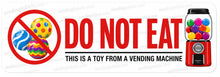 Load image into Gallery viewer, Bumper sticker with 'Do Not Eat' text and images of a toy and a gumball machine.
